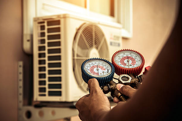 Professional Heat Pump Repair technician working in Riverton, IL